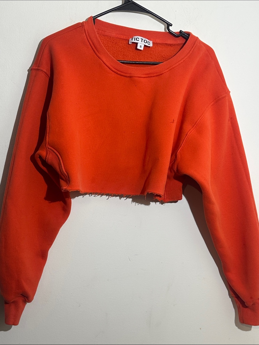 Tic Toc Orange Cropped Sweatshirt with Raw Hem